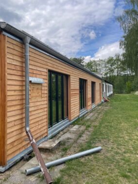 energetische Sanierung einer Außenwand, Keil-Stülp-Schalung, Fenster- Einbau
